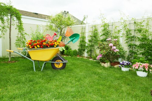 A Burnt Oak garden design showing structured planting and lawn space